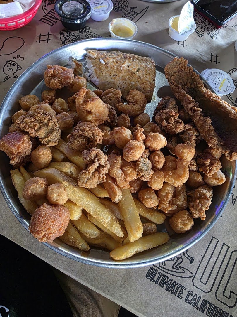 Rustic seafood shack with maritime decor.